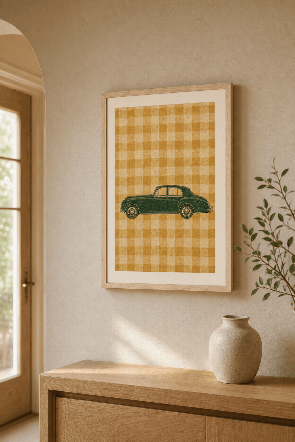 Bentley S2 artwork displayed in a natural maple frame in a warm, neutral interior