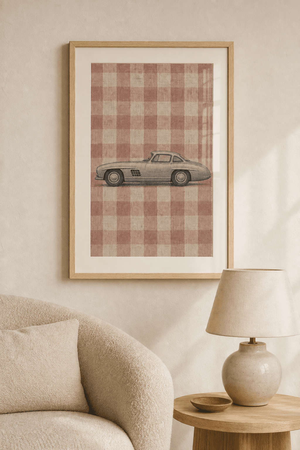 Mercedes-Benz 300SL artwork displayed in a natural maple frame in a warm, neutral interior