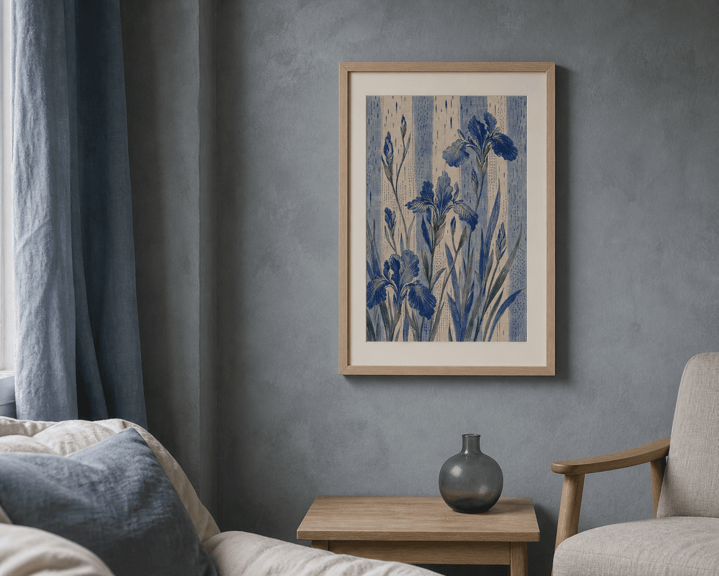 Framed Iris Rain artwork on a deep blue-grey wall beside a linen sofa and a small side table